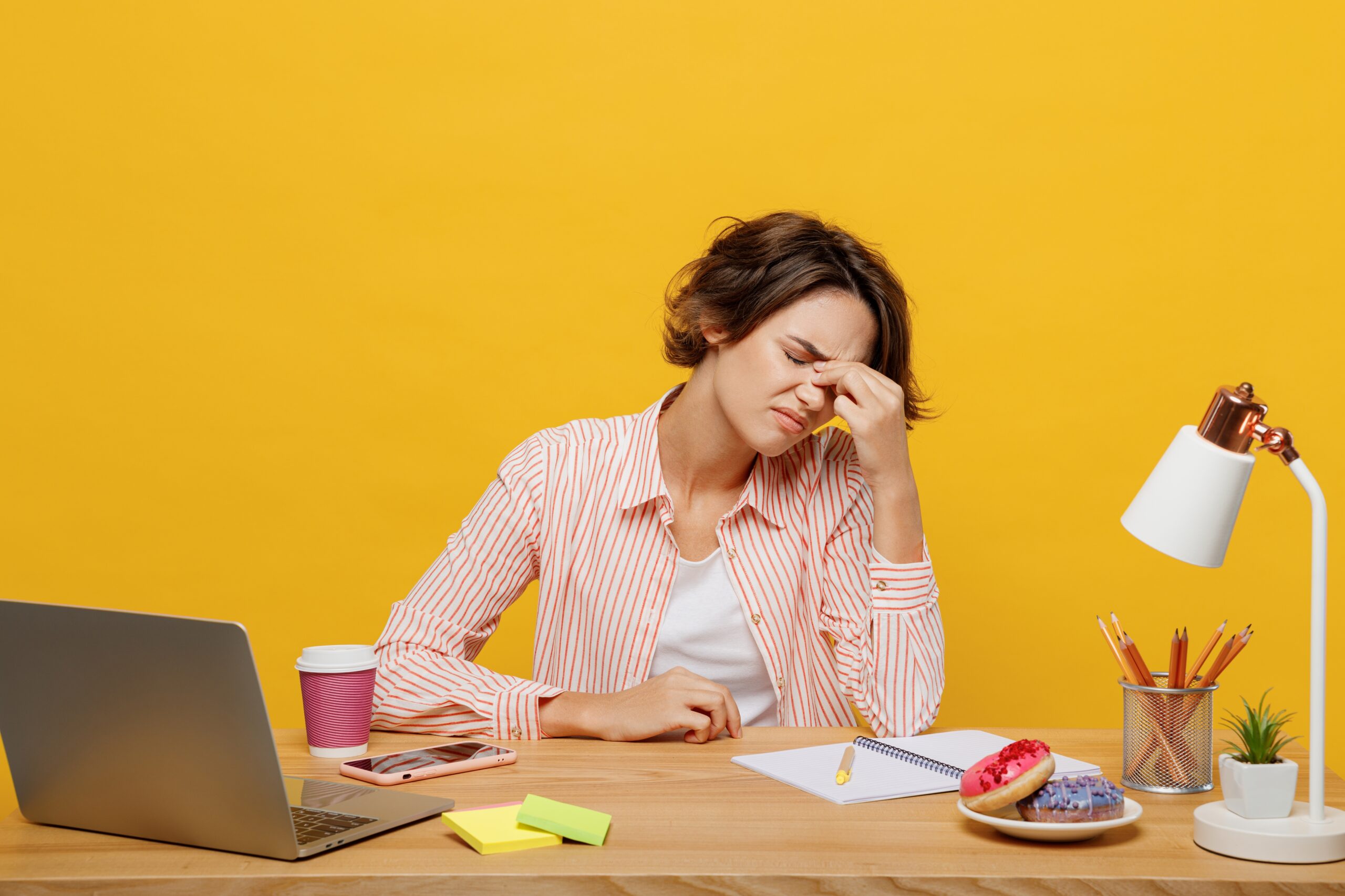 Young,Sad,Employee,Business,Woman,Wear,Casual,Shirt,Sit,Work IT issues may be costing your business and eroding your efficiency